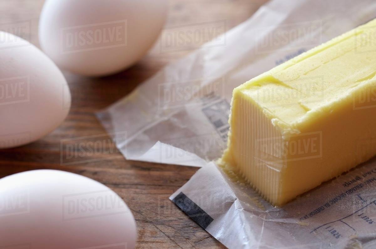 A Stick of Butter and Eggs Stock Photo Dissolve