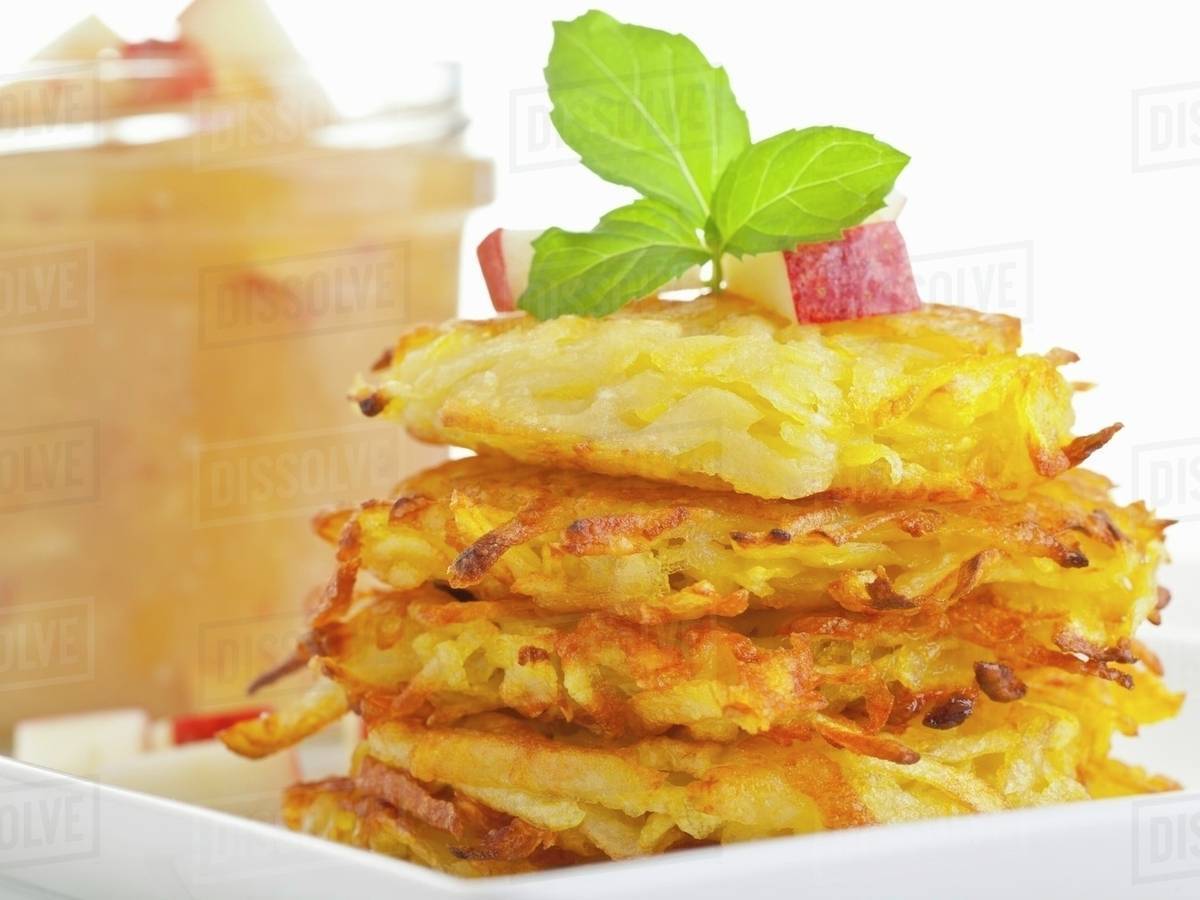 Potato rostis with apple puree - Stock Photo - Dissolve