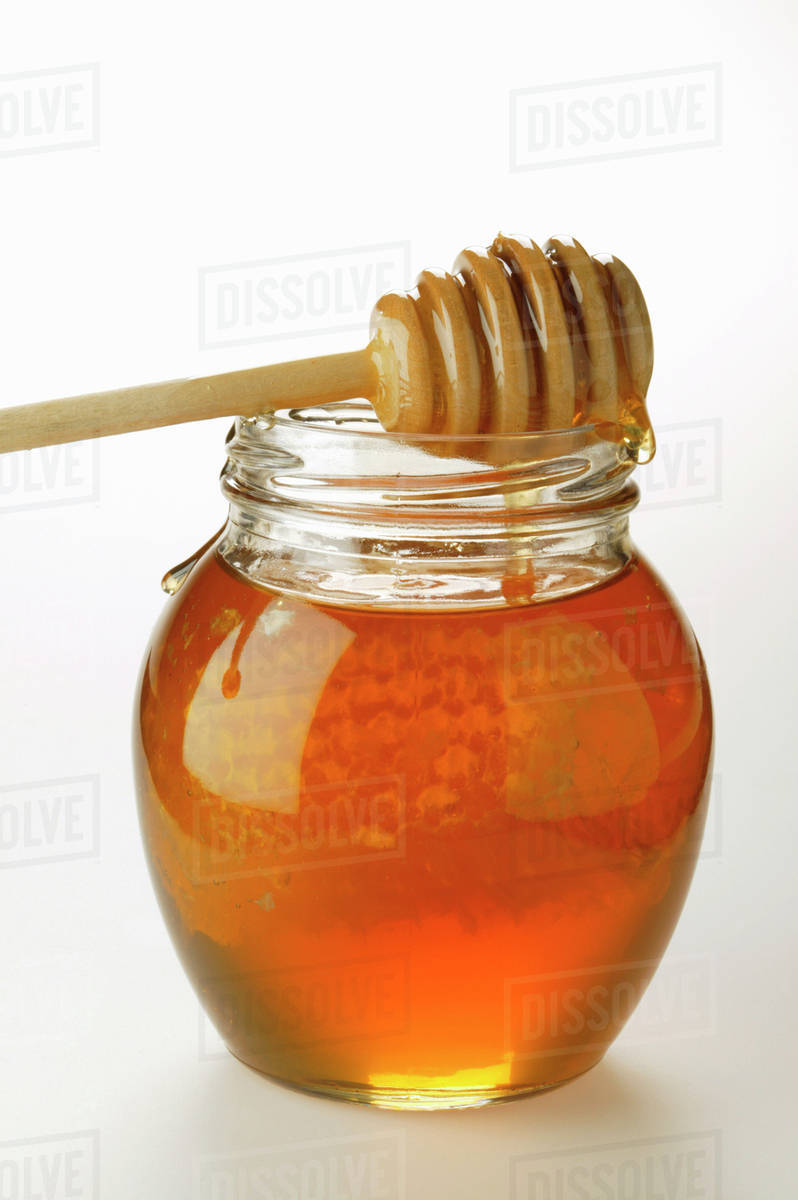Honey in jar with Stock Photo Dissolve