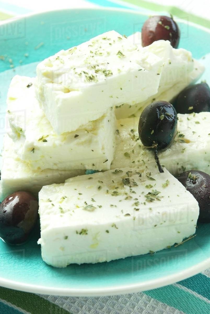 Greek Feta Cheese with Oregano and Kalamata Olives Stock Photo Dissolve