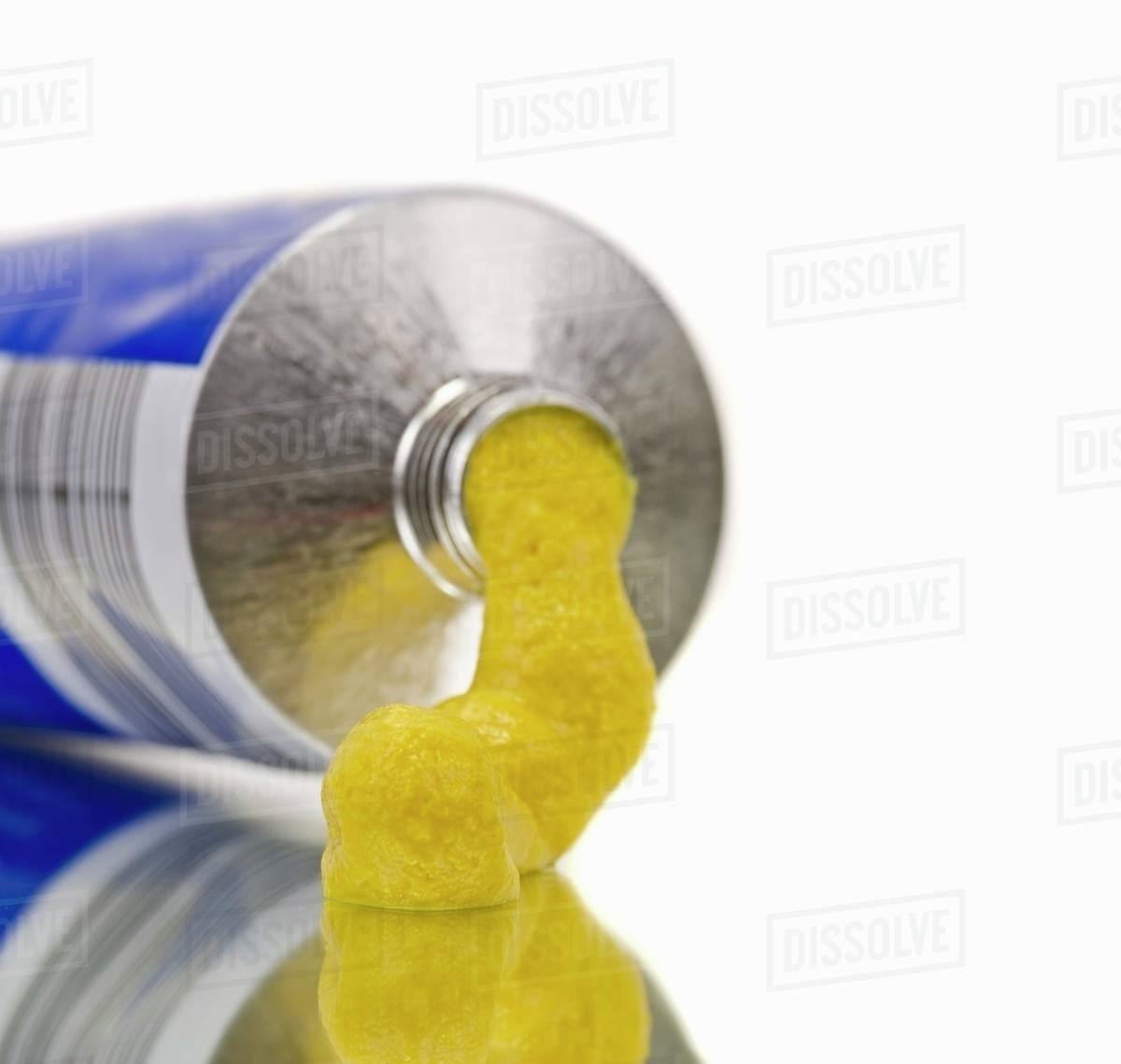 A tube of mustard Stock Photo Dissolve