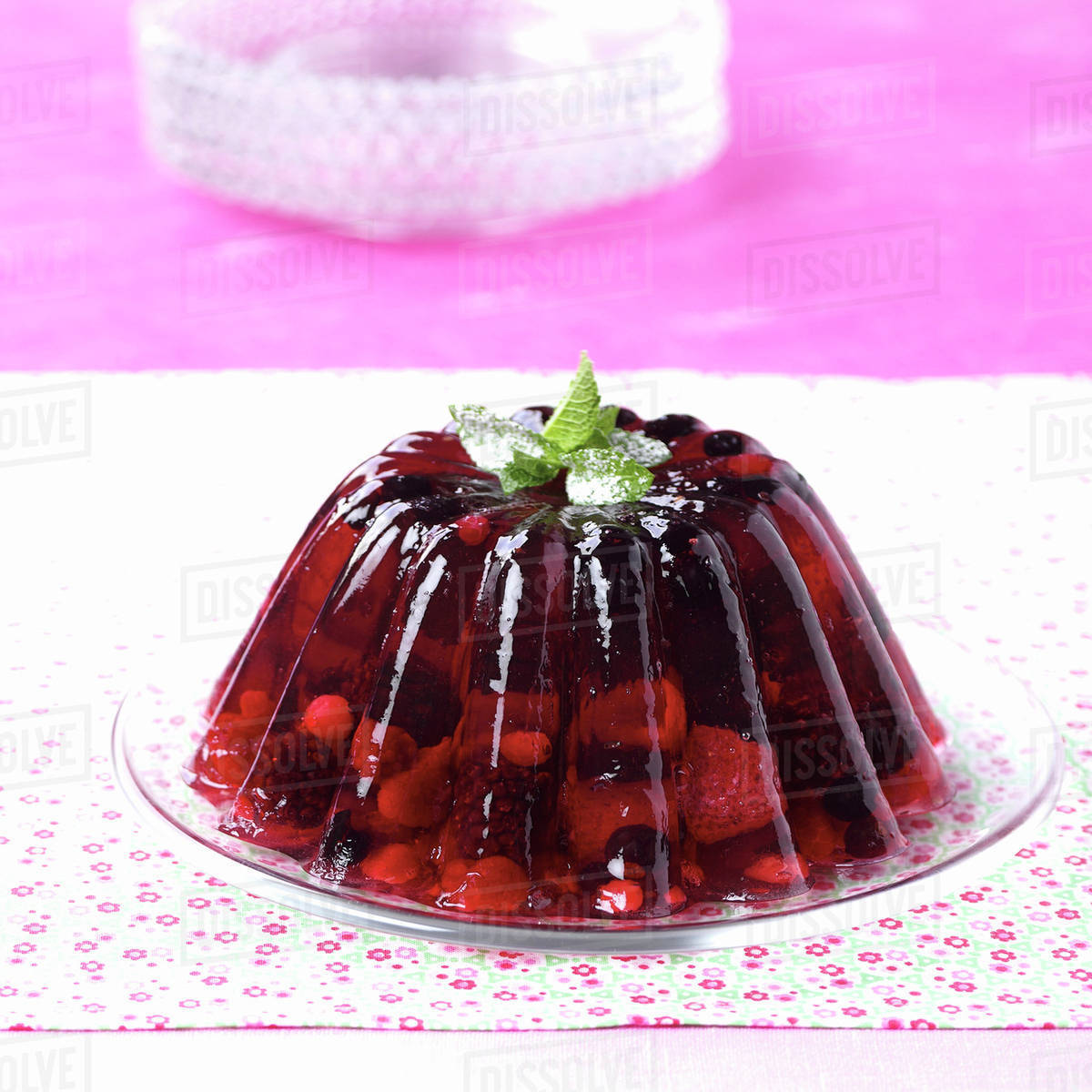 Rose wine jelly with berries Stock Photo Dissolve