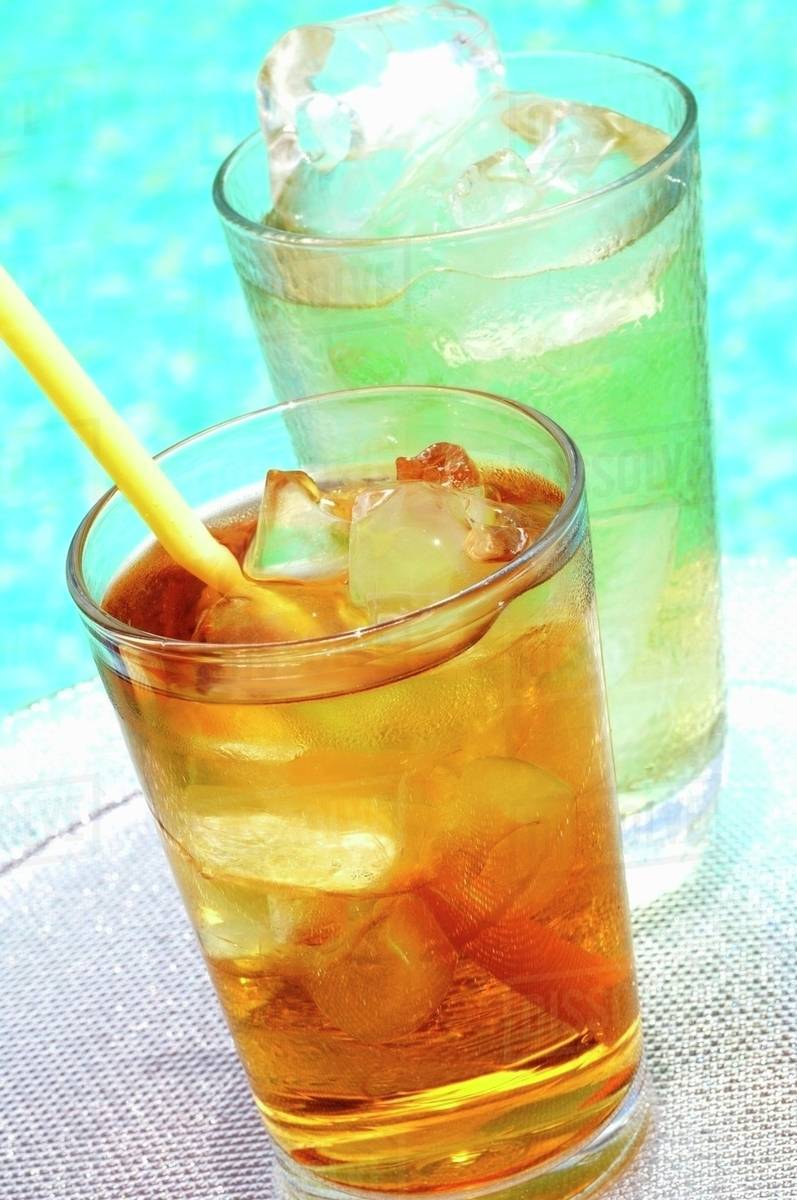Oolong tea with ice cubes and iced lemon grass tea Stock Photo Dissolve