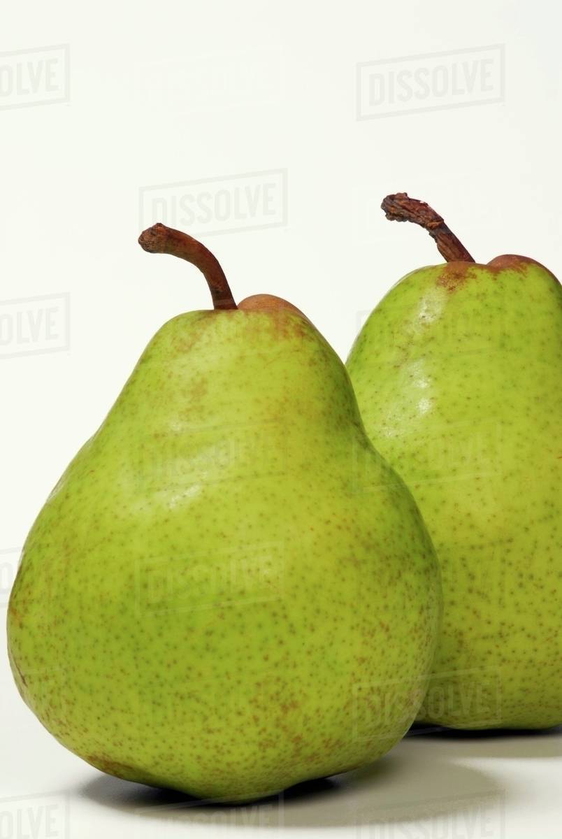 Two green pears Stock Photo Dissolve