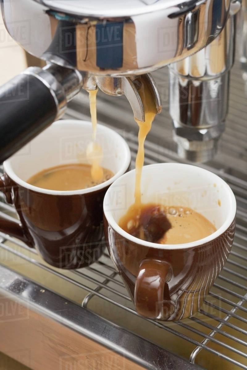 Making espresso Stock Photo Dissolve