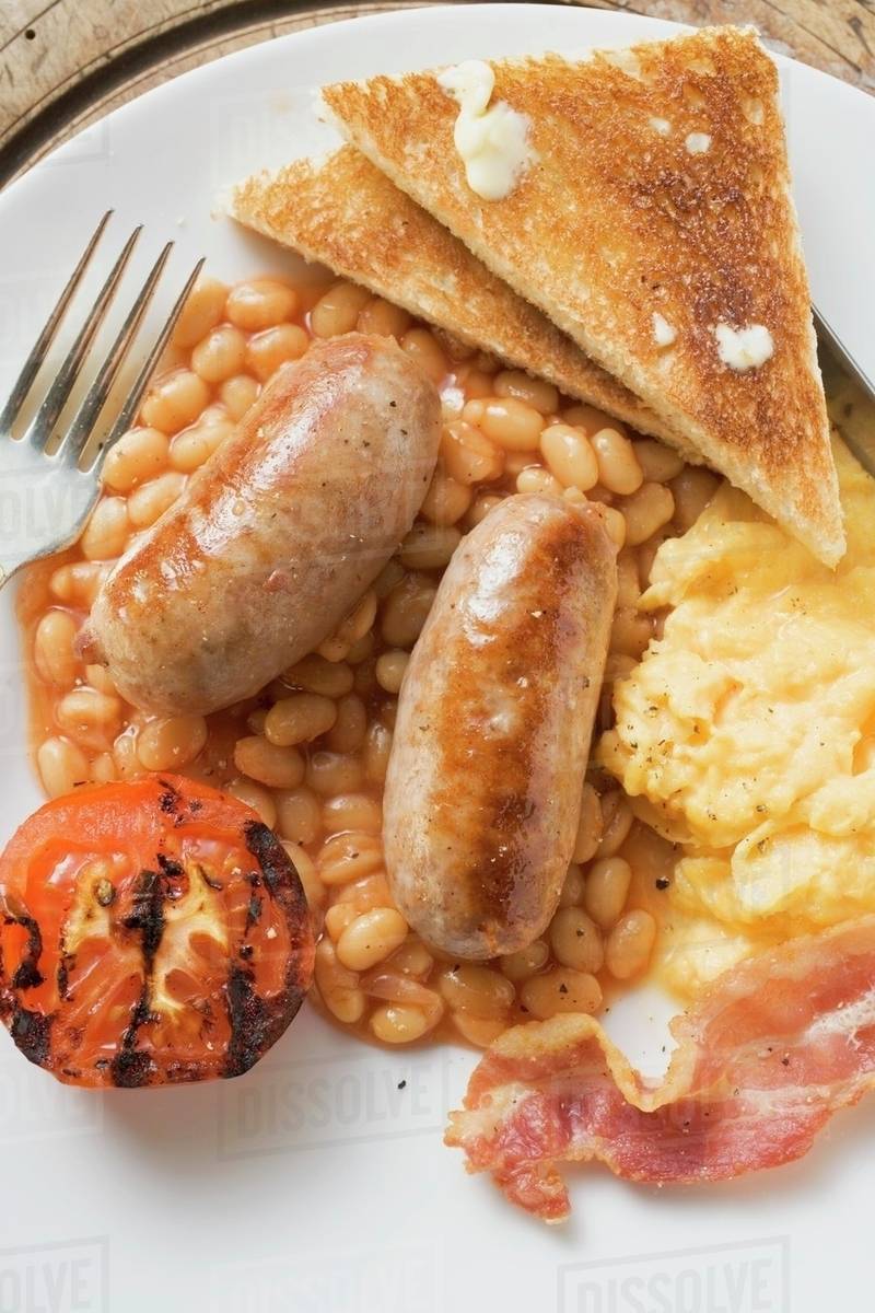 Baked Beans With Scrambled Egg Sausages Bacon Tomato Toast Stock Photo Dissolve