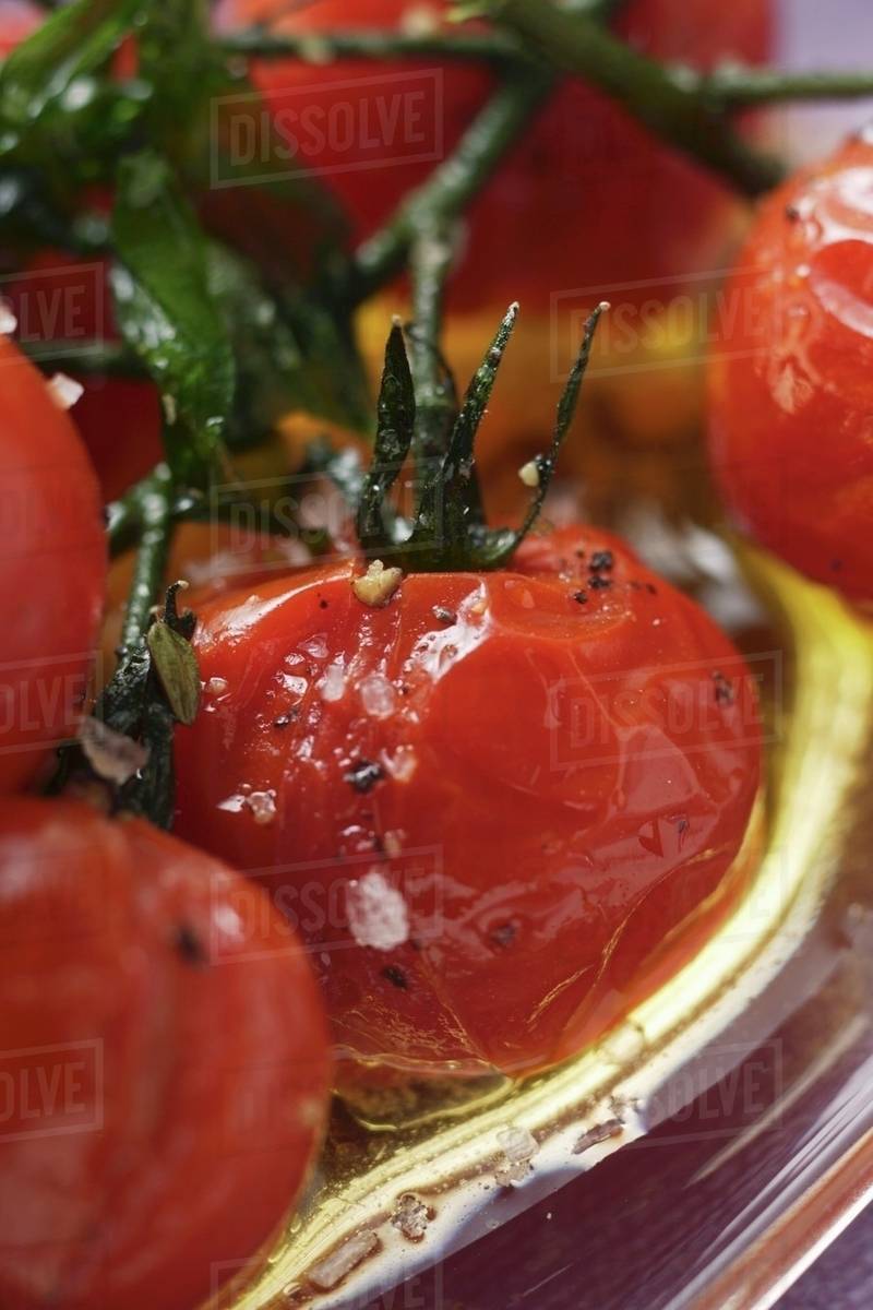 Stewed cherry tomatoes Stock Photo Dissolve