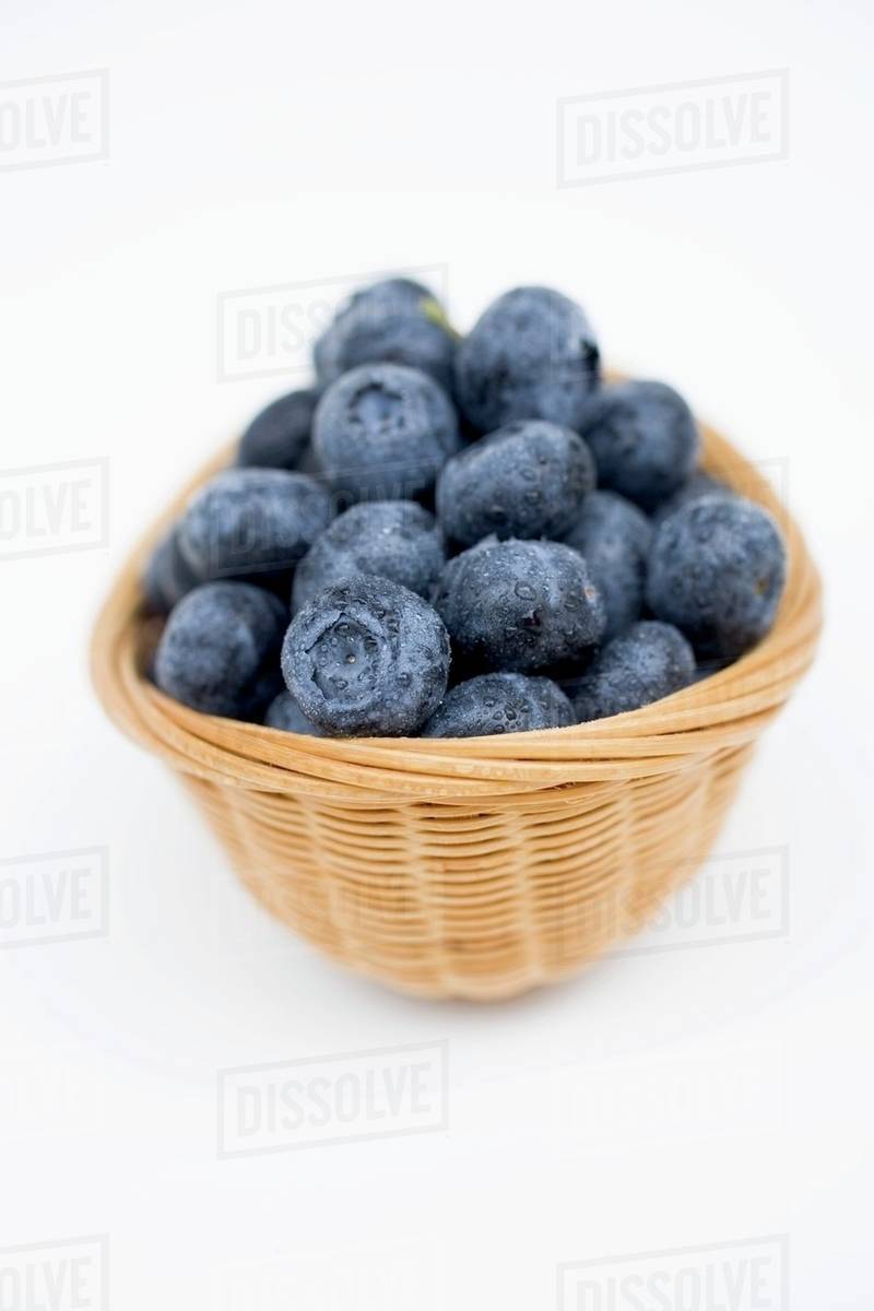 Blueberries in basket - Stock Photo - Dissolve