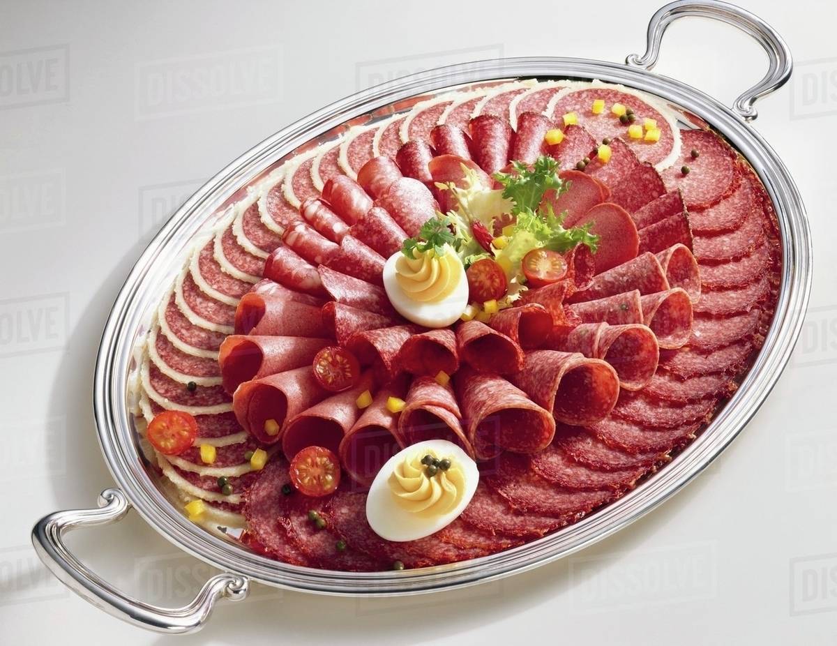 Salami platter with boiled eggs Stock Photo Dissolve