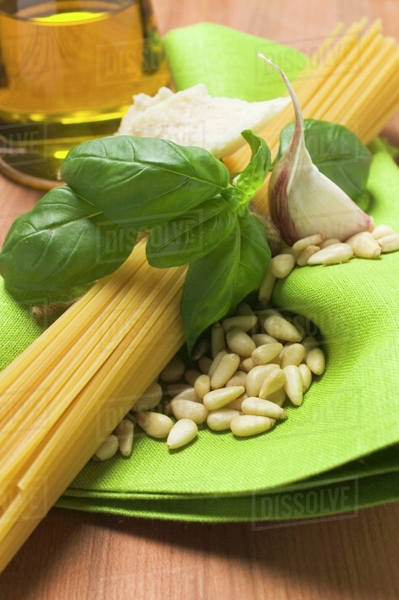Spaghetti and pesto ingredients Stock Photo Dissolve