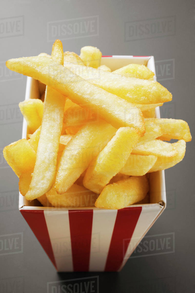 Chips in striped box Stock Photo Dissolve