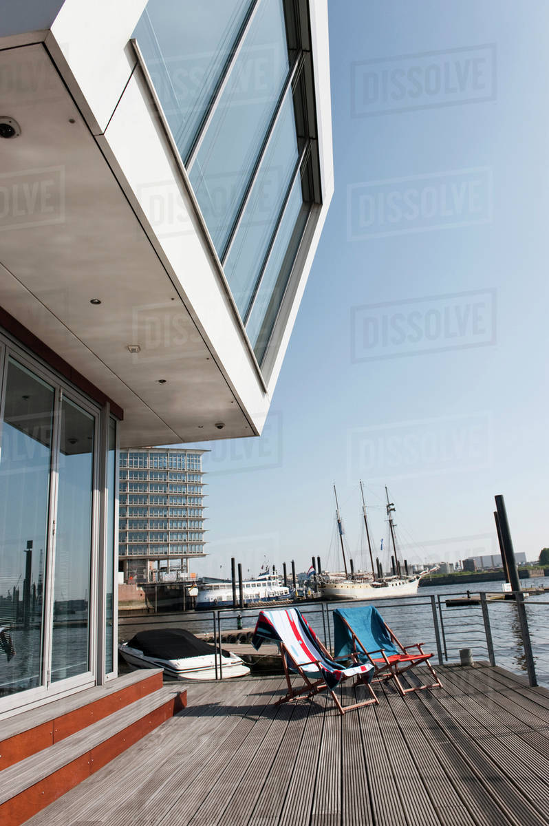 Germany Hamburg Empty Deck Chairs On Floating Home Stock Photo Germany Hamburg Empty Deck Chairs On Floating Home
