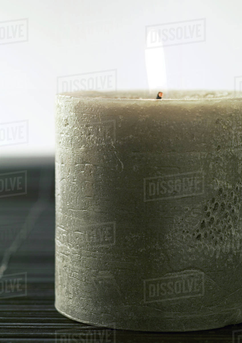 Lit candle Stock Photo Dissolve