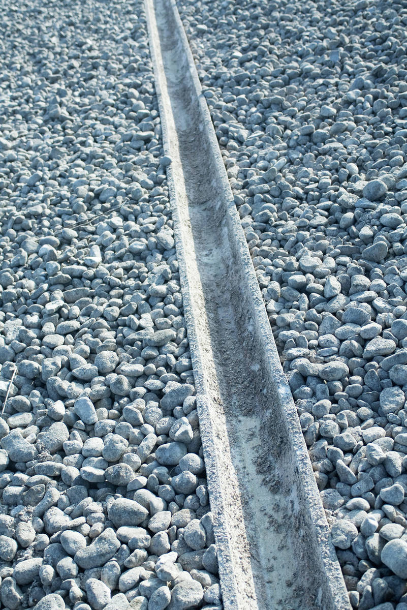 Gravel and concrete drain Stock Photo Dissolve