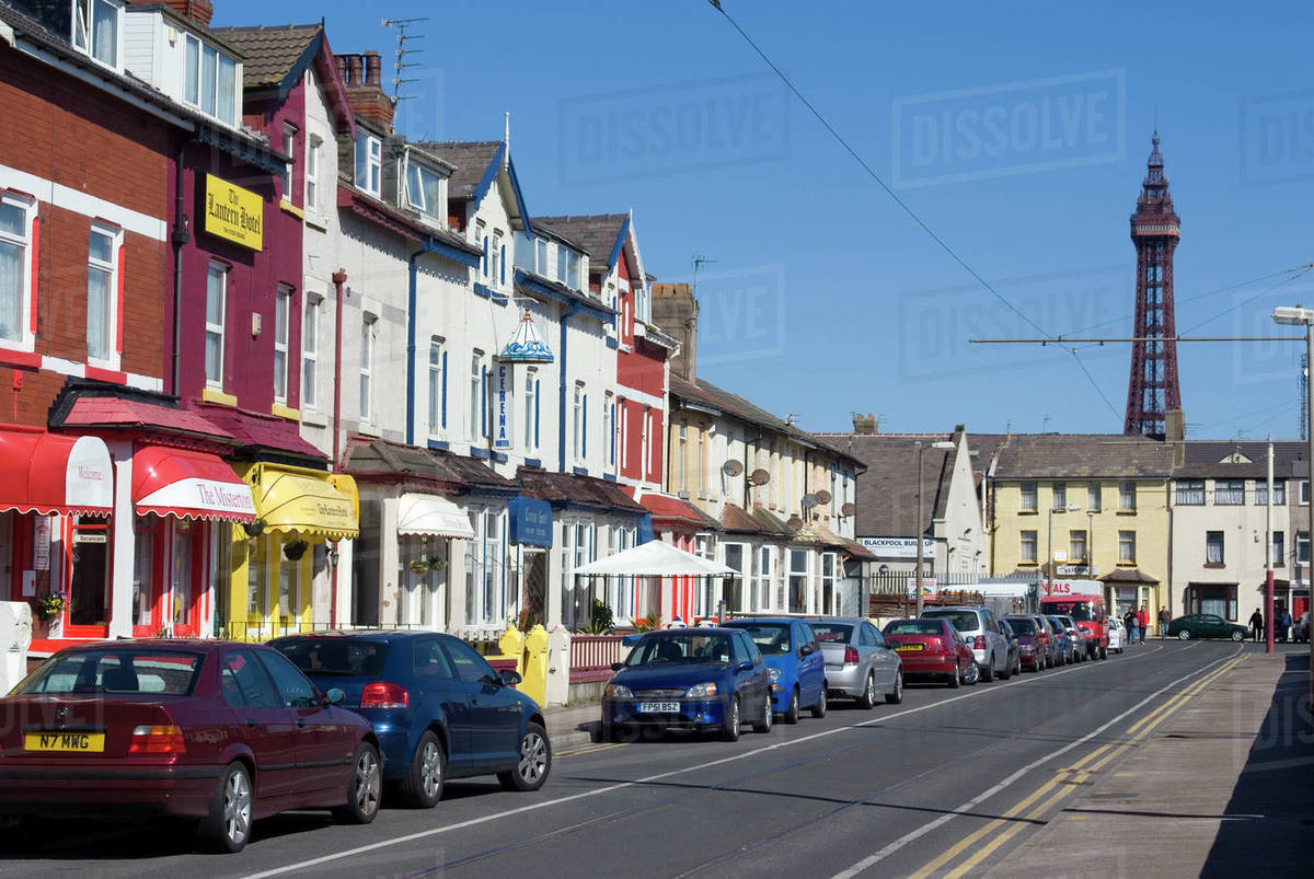 Row of small hotels with the Tower in the background, Blackpool, Lancashire, England, UK