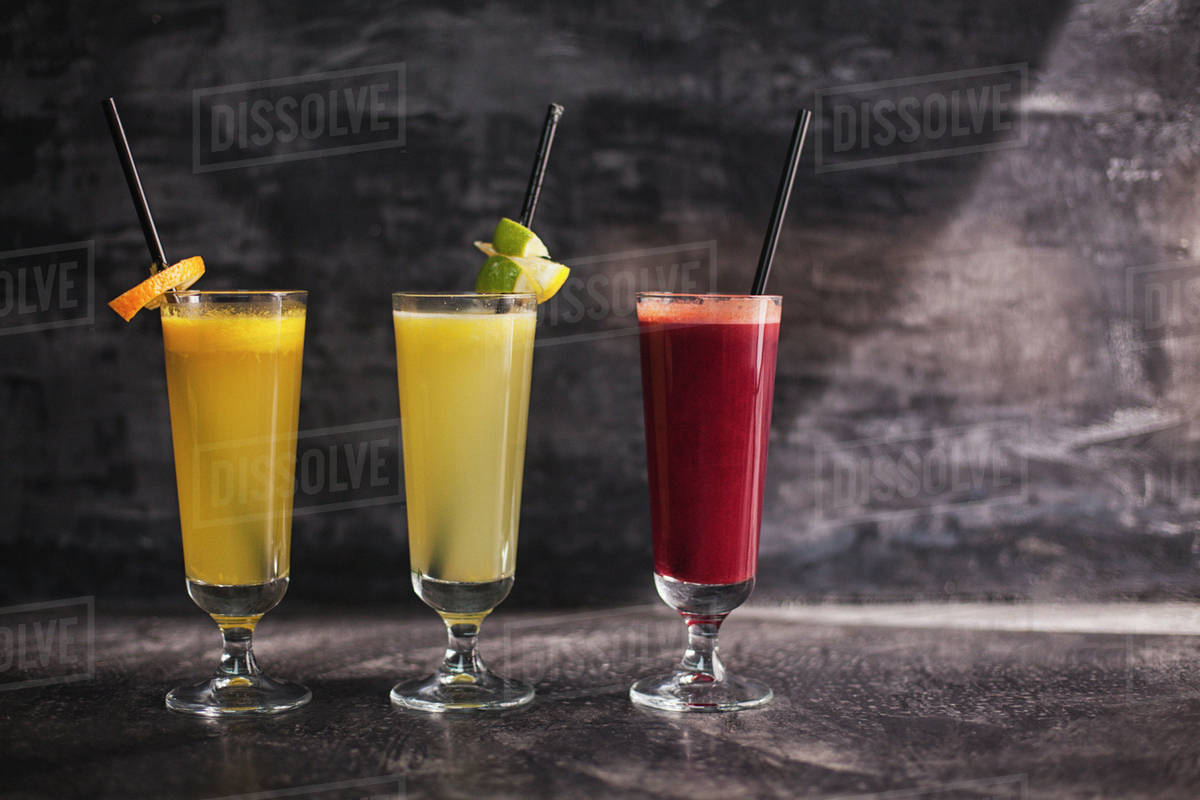 Close up of variety of healthy juices Stock Photo Dissolve