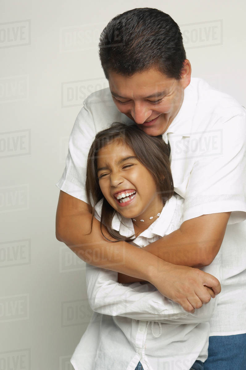 hispanic father and daughter