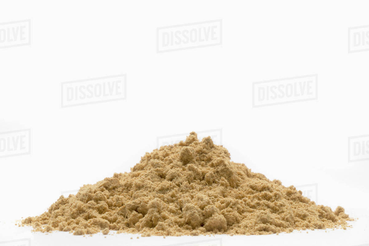 Pile of brown powder Stock Photo Dissolve