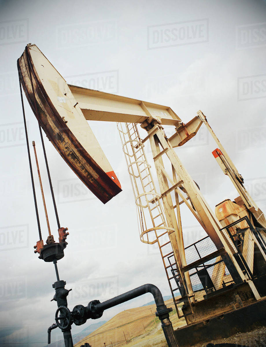 Nodding donkey oil rig Stock Photo Dissolve