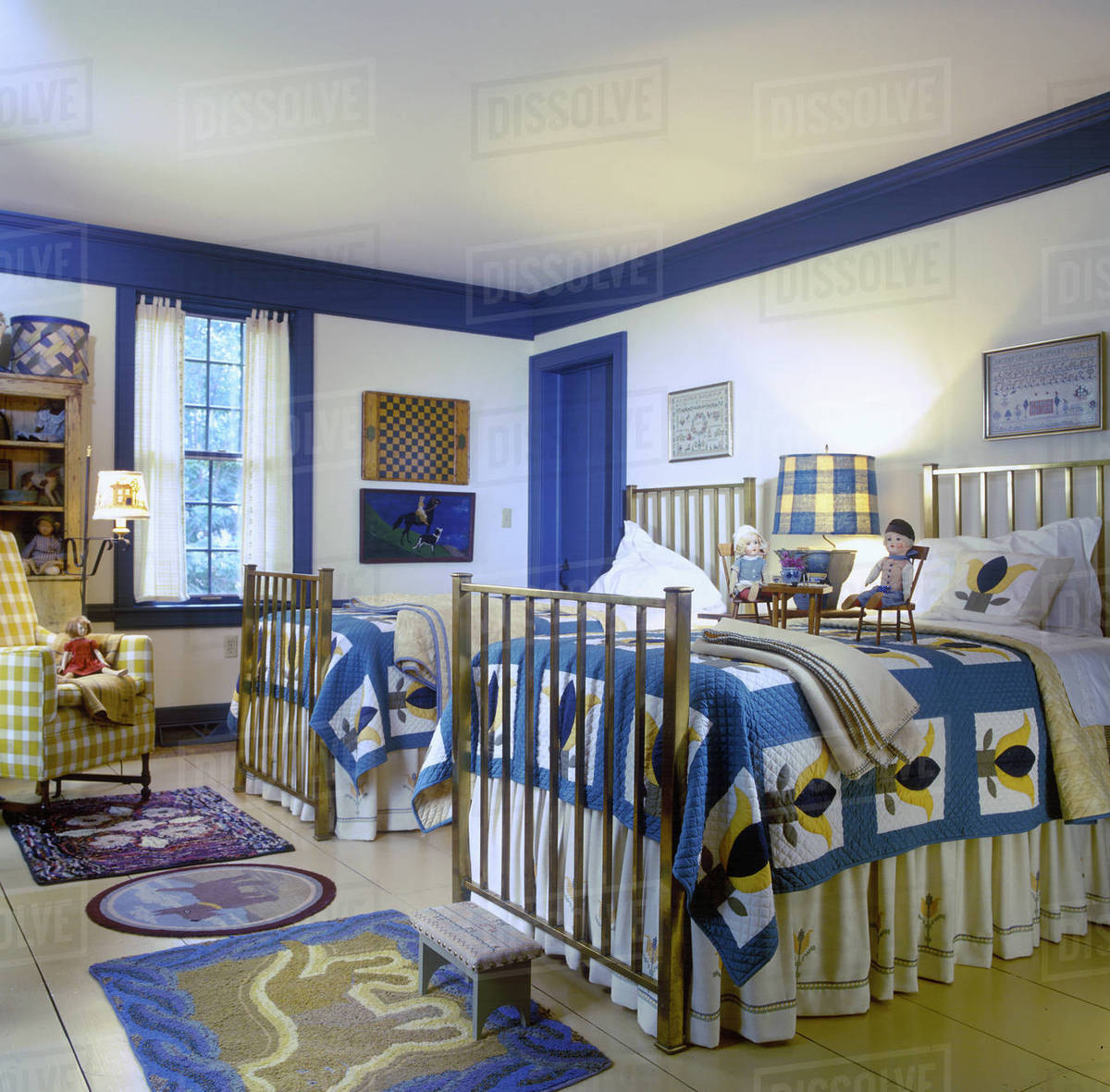 Children S Room Country Style Matching Quilts On Twin Beds Yellow Children S Room Country Style Matching Quilts On Twin Beds Yellow And Blue Color Theme Br Painted Wide Plank Wood Floors Hooked Rugs