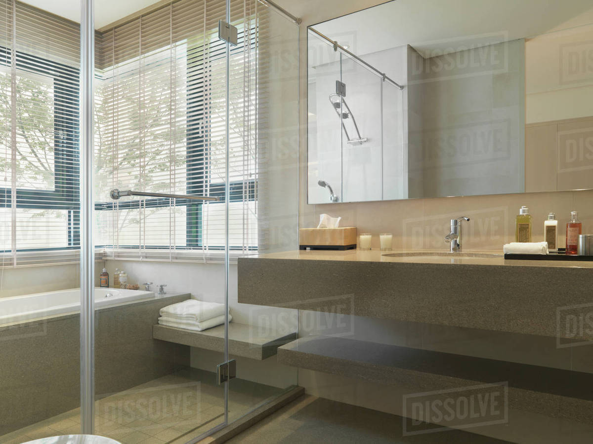 Modern bathroom with glass shower - Stock Photo - Dissolve