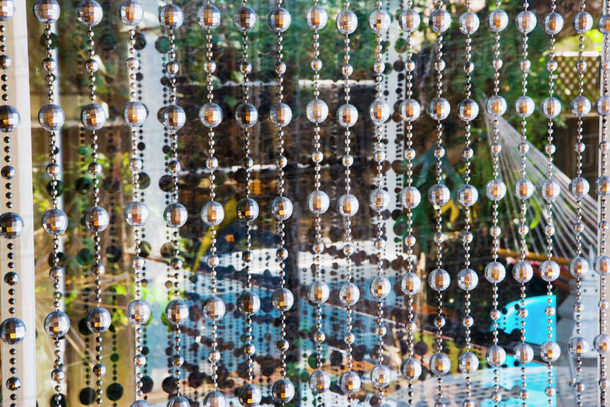 Bead Curtains In Front Of Window Stock Photo Dissolve
