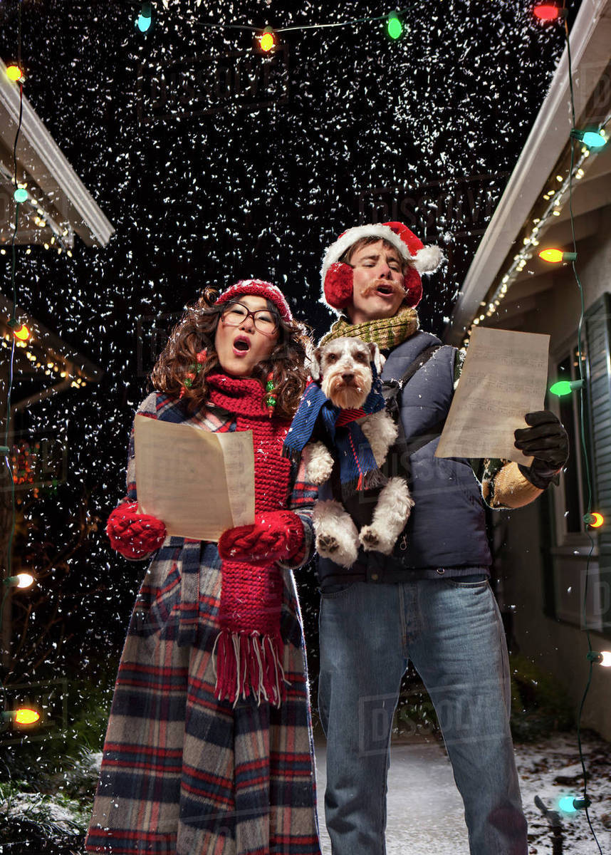 dog singing christmas carols