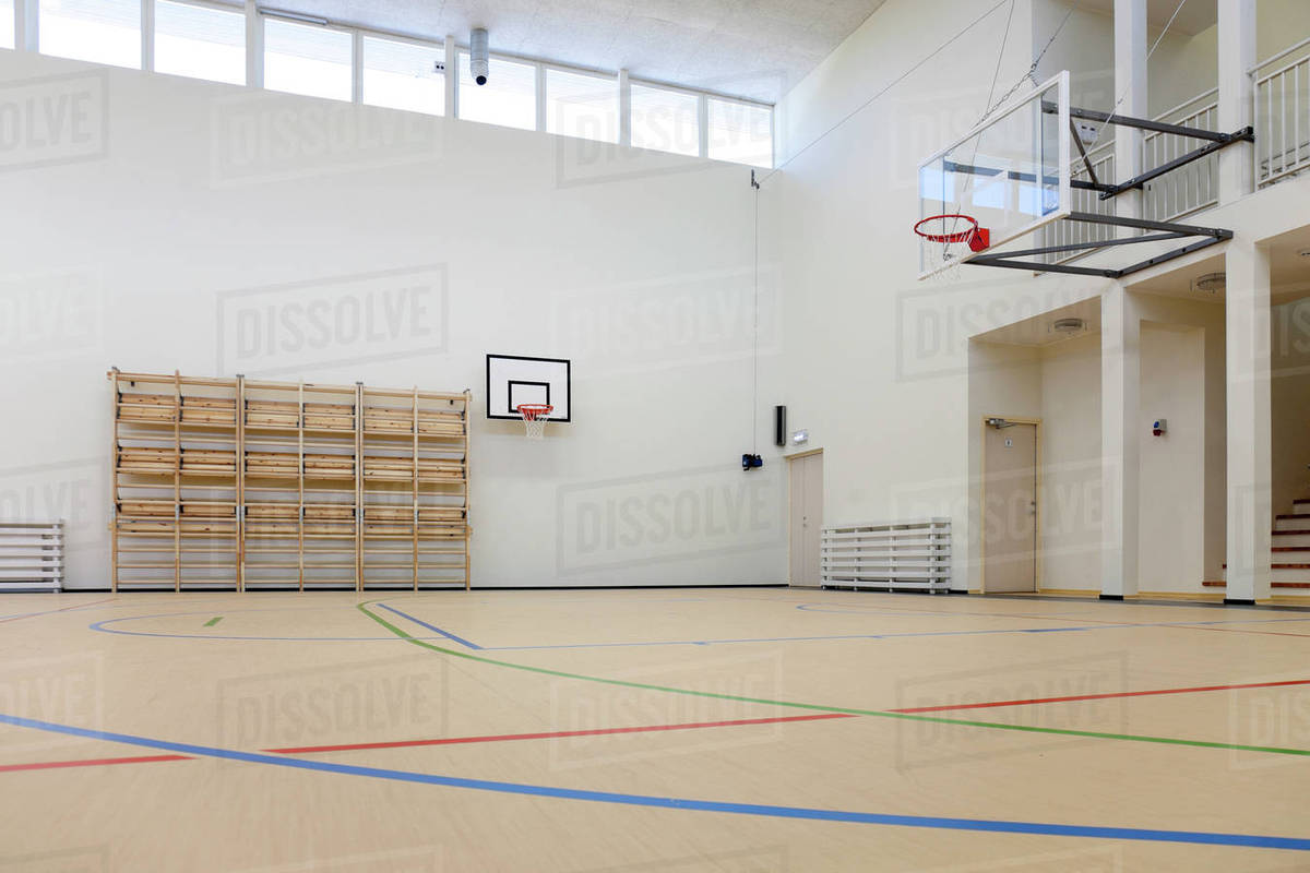 Empty indoor basketball court Stock Photo Dissolve
