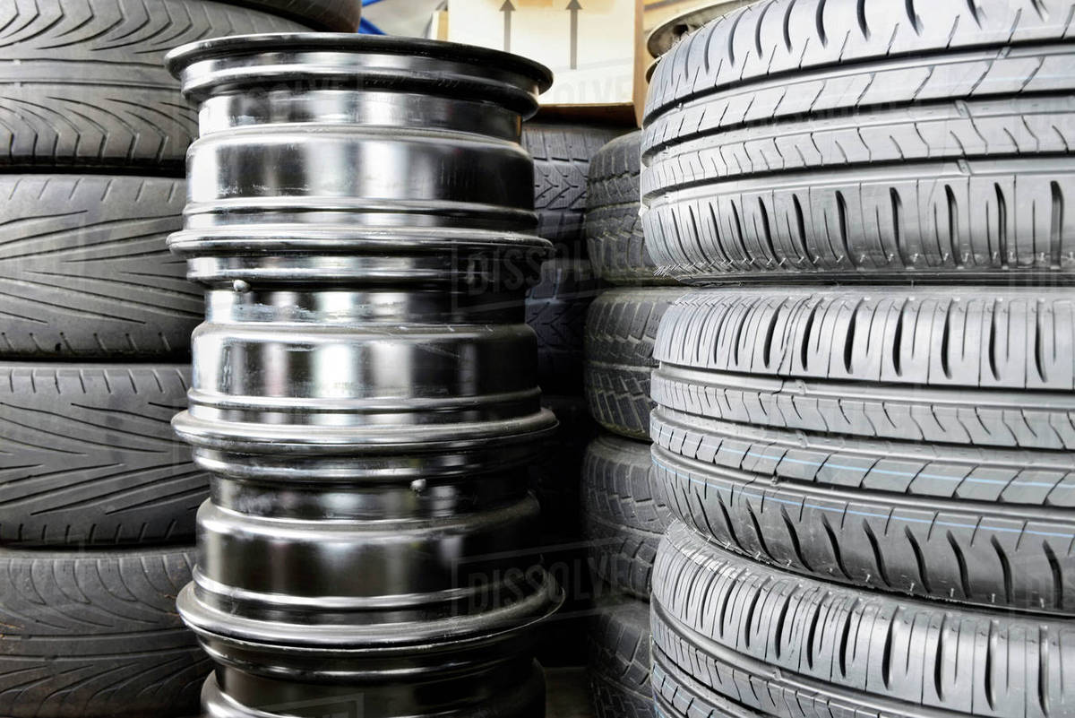 Stack of new rubber tires Stock Photo Dissolve