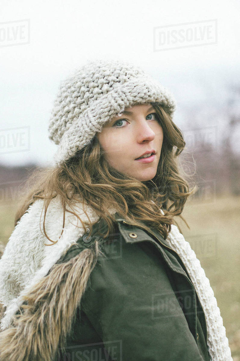 Caucasian woman wearing knitted cap Stock Photo Dissolve