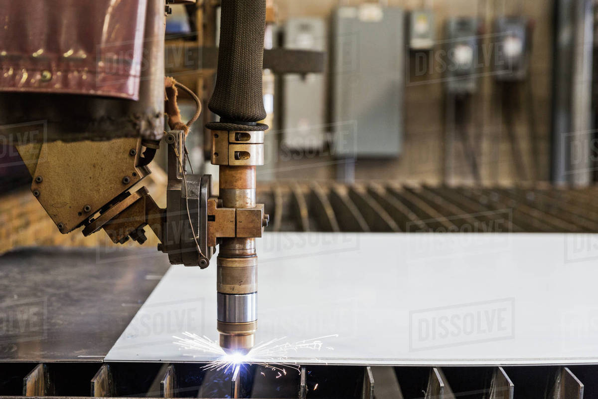 Sparking cutting tool in metal fabrication factory Stock Photo Dissolve