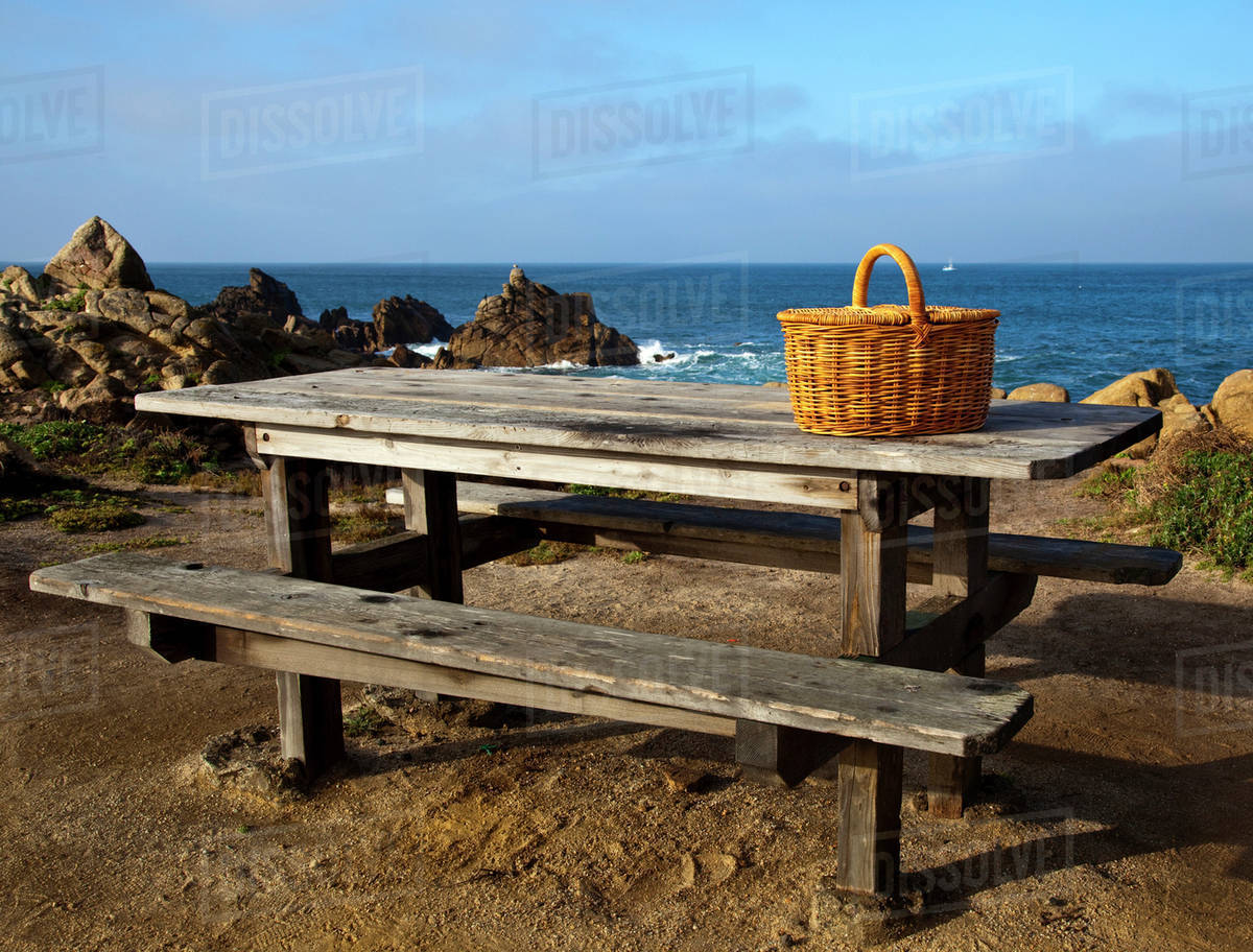Picnic Basket on Wooden Picnic Table Stock Photo Dissolve
