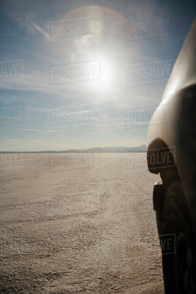 Close up of car driving on salt flats, Bonnaville Salt Flats, Utah