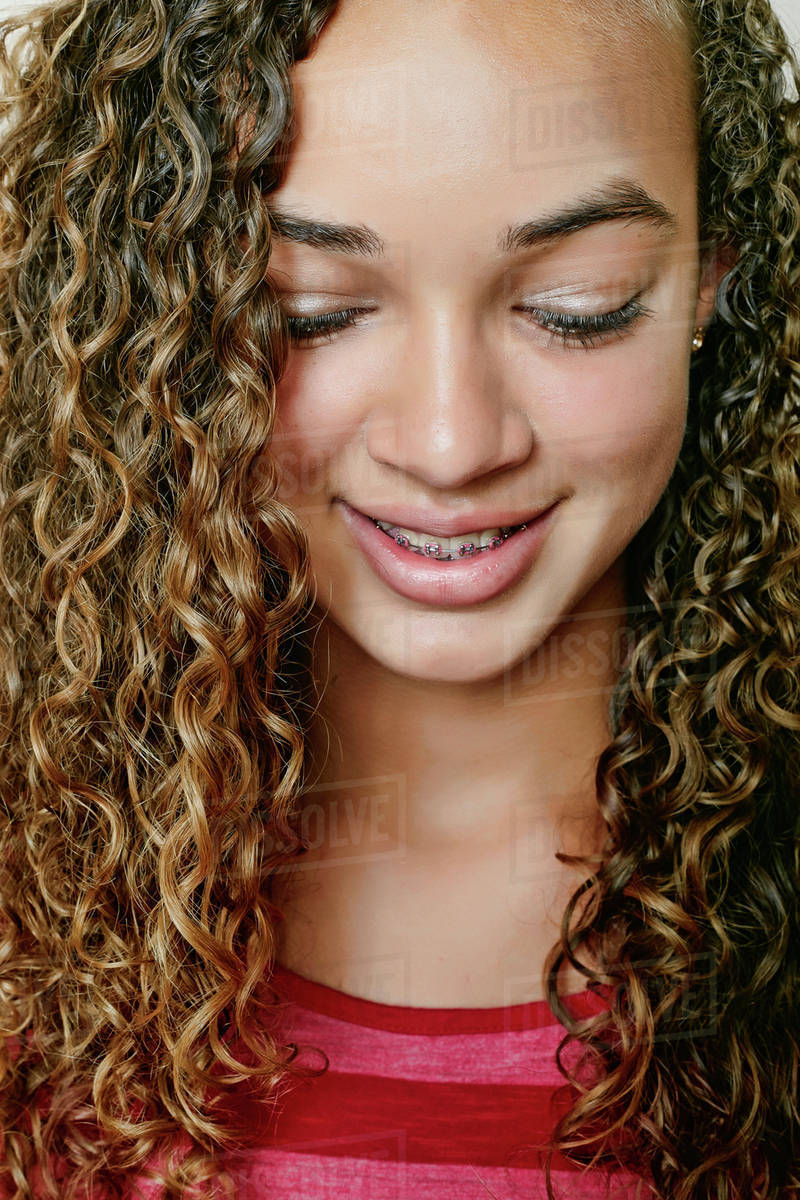 Mixed Race Girl Smiling Stock Photo Dissolve