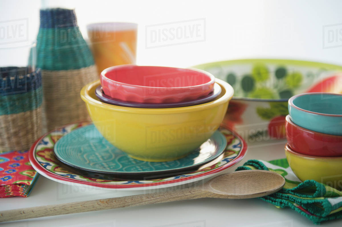 Colorful plates and bowls Stock Photo Dissolve