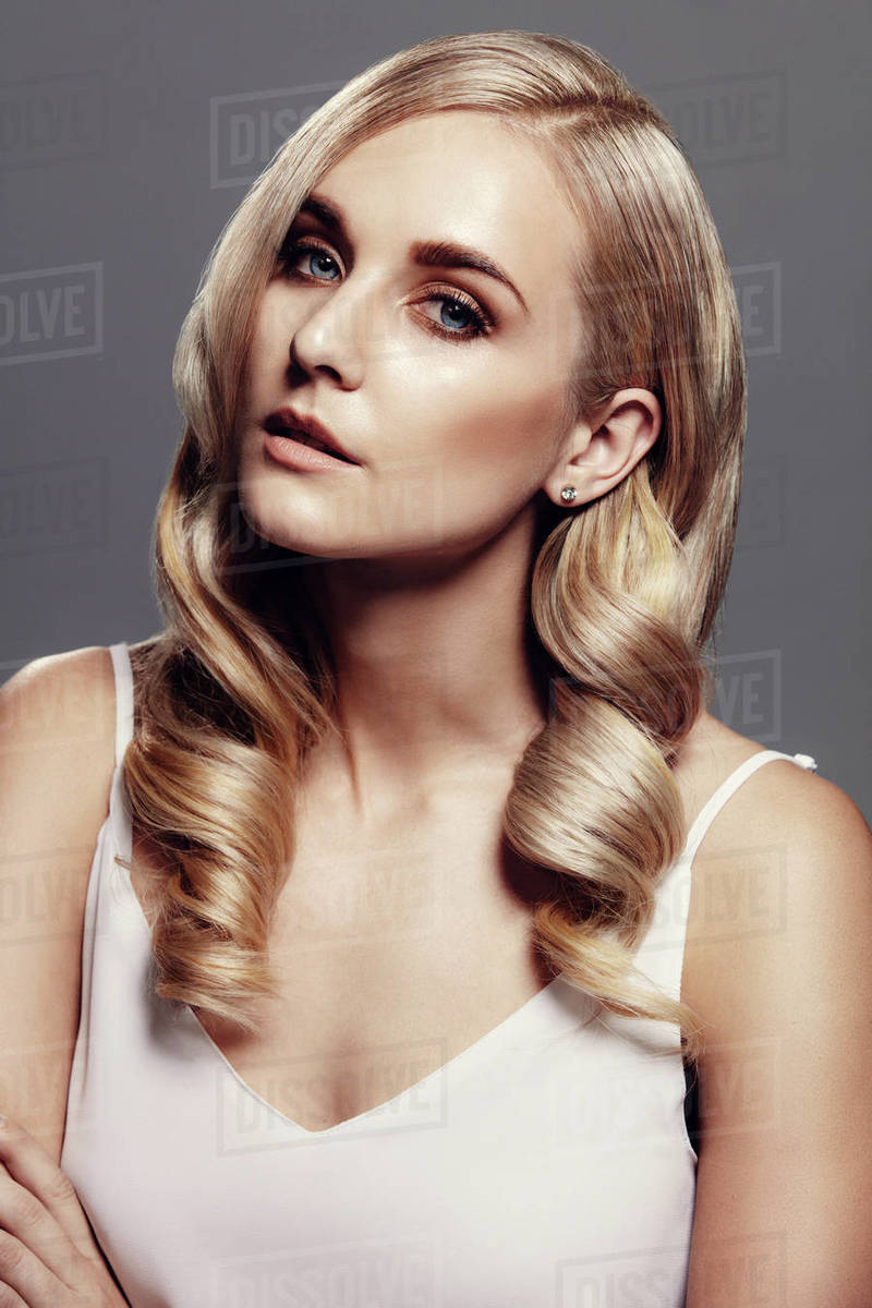 Close Up Vertical Shot Of Stylish Female Model With Perfect Skin