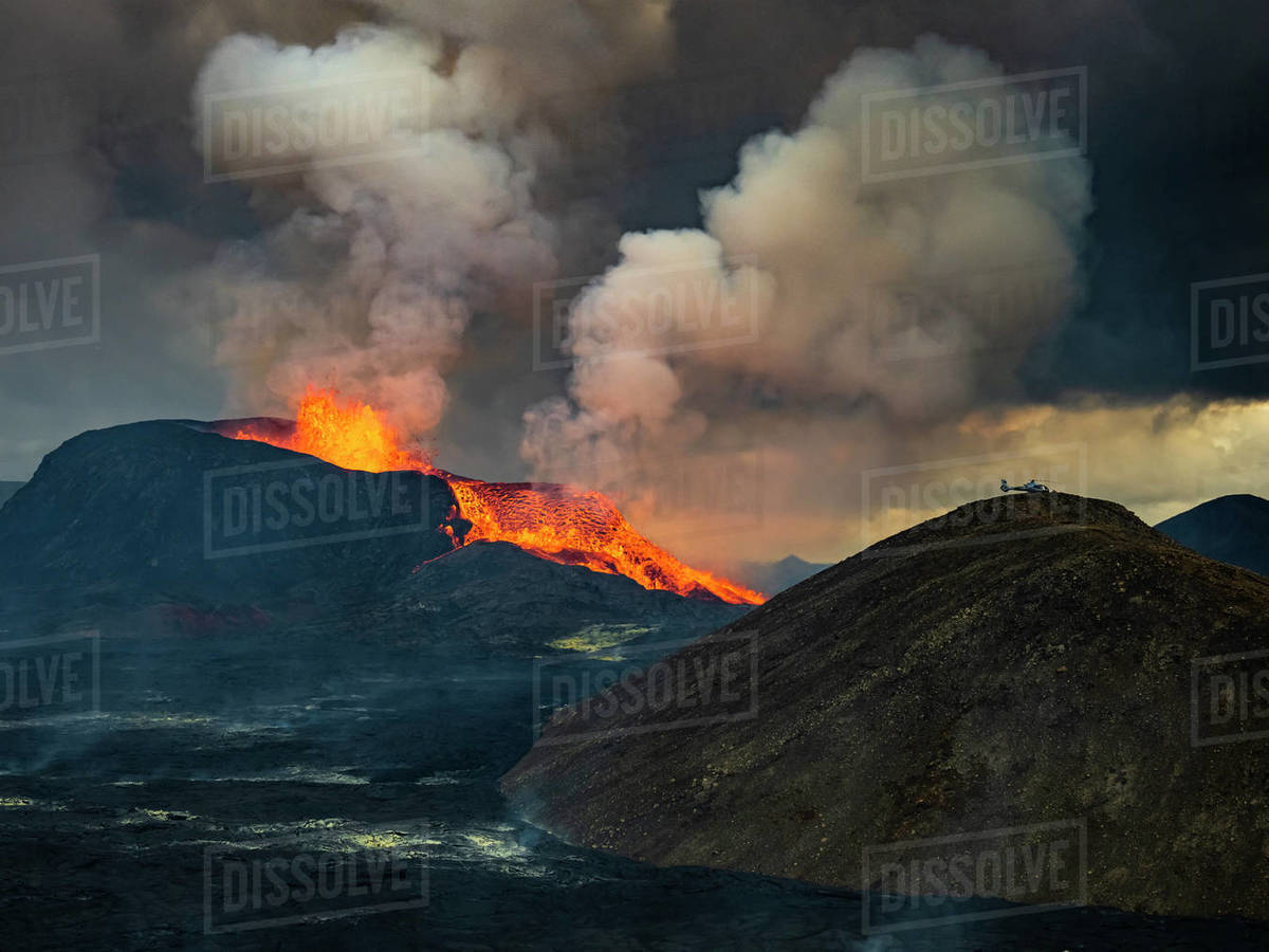 Glowing lava is ejected skyward as lava spills from Fagradalsfjall