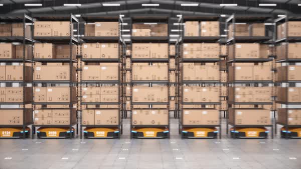 Row of autonomous robots move shelves or racks with cardboard boxes in ...