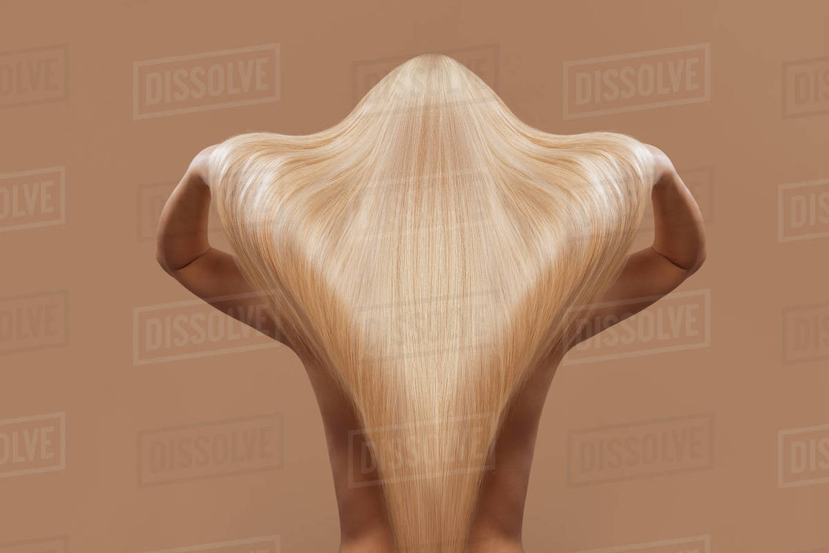Back View Of Girl With Beautiful Long Blonde Hair Isolated On