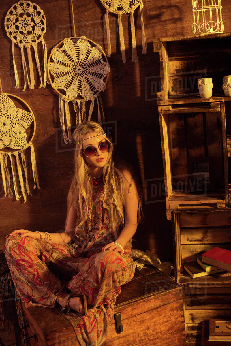Portrait of young beautiful hippie woman with long blond hair - Stock Photo  - Dissolve