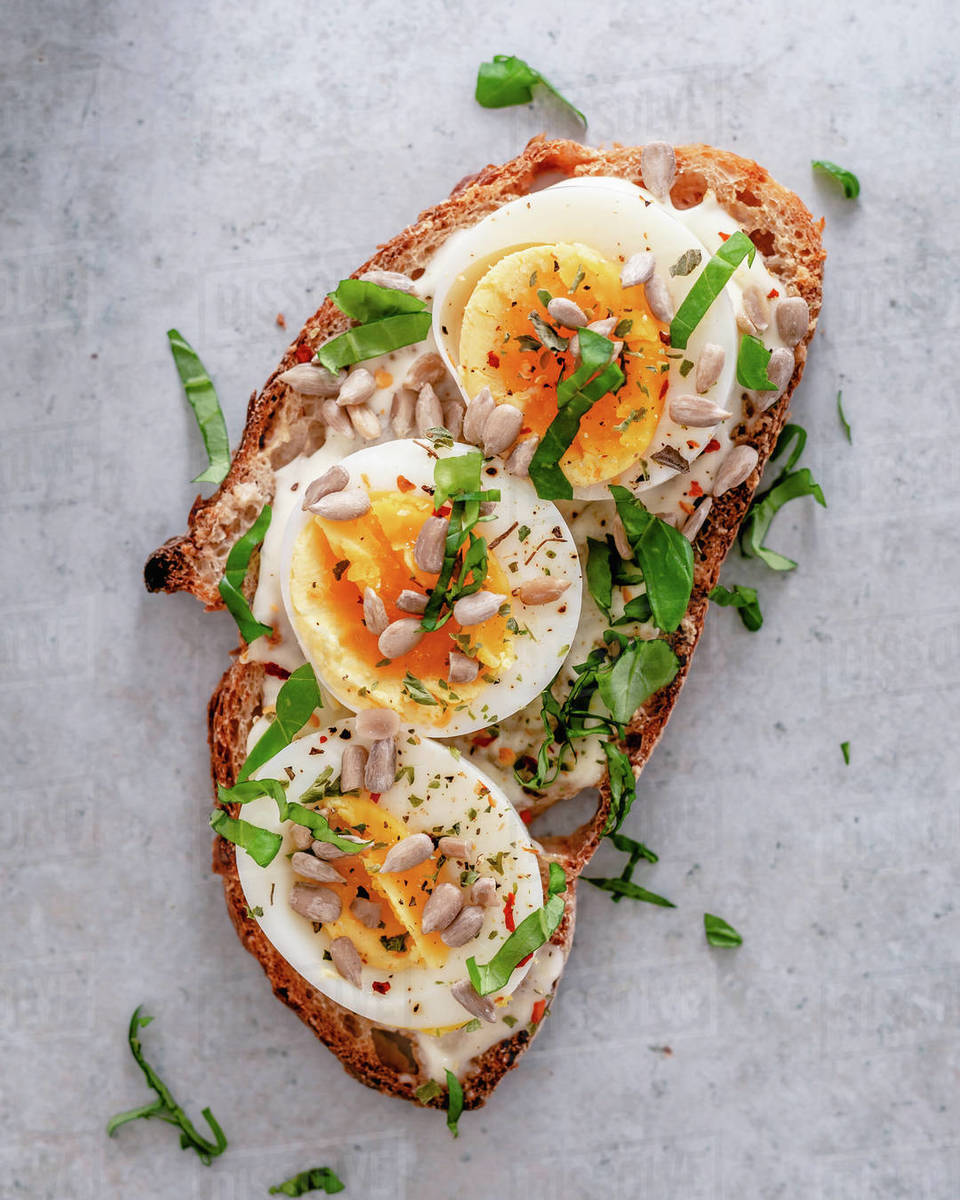 Egg mayonnaise toast with sunflower seeds Stock Photo Dissolve