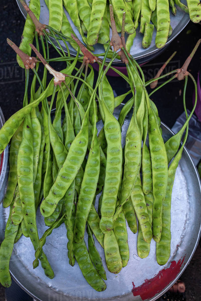 Overhead view of bitter beans, Thailand Stock Photo Dissolve