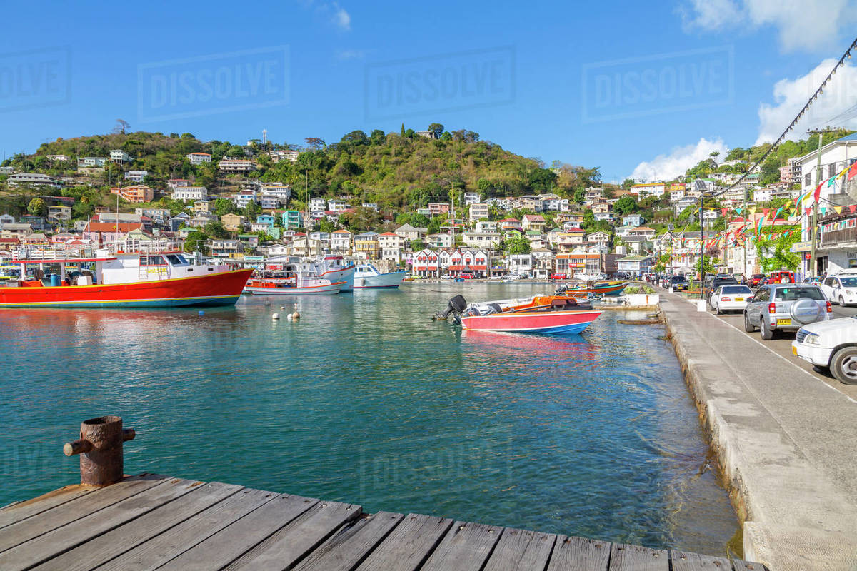 Colourful boats and houses on the Carenage of St. George's, Grenada, Windward Islands, West Indies, Caribbean, Central America Royalty-free stock photo