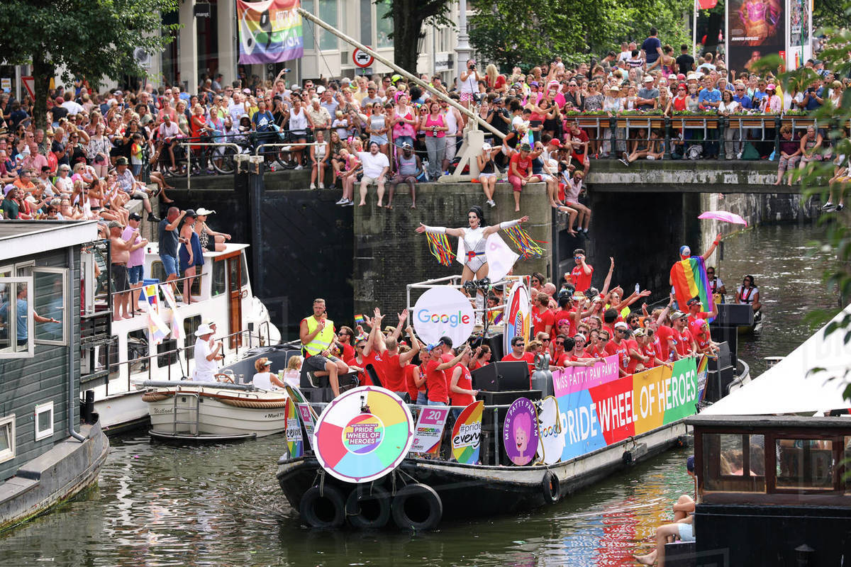 Google boat at Gay Pride parade, Canal parade in Amsterdam, North Holland, The Netherlands, Europe Royalty-free stock photo