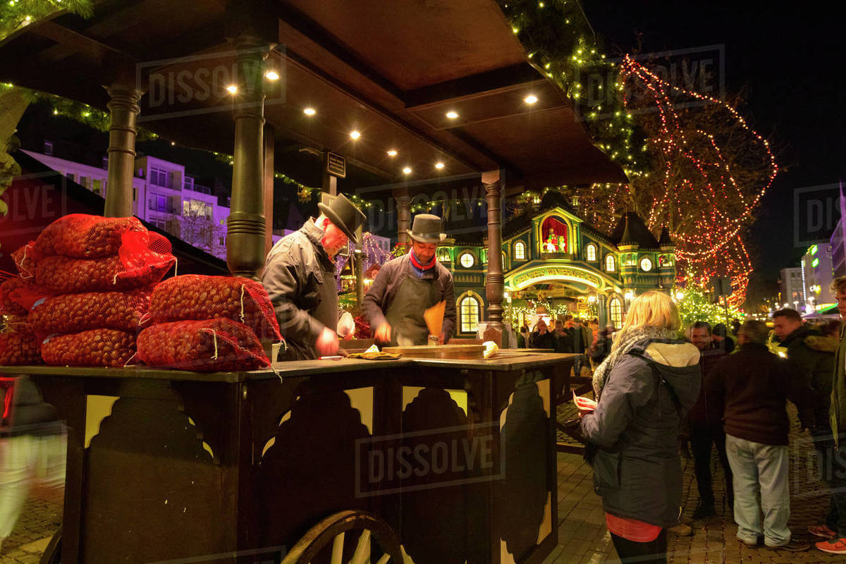 Roasted Chestnut Vendors, Cologne Christmas Market, Cologne, North Rhine-Westphalia, Germany, Europe Royalty-free stock photo