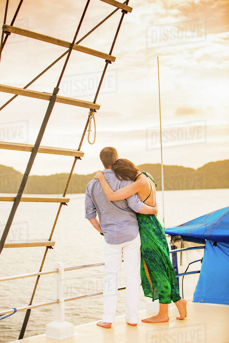 Couple enjoying the sunset on the Palau Siren, Koror Island, Palau, Micronesia, Pacific Royalty-free stock photo