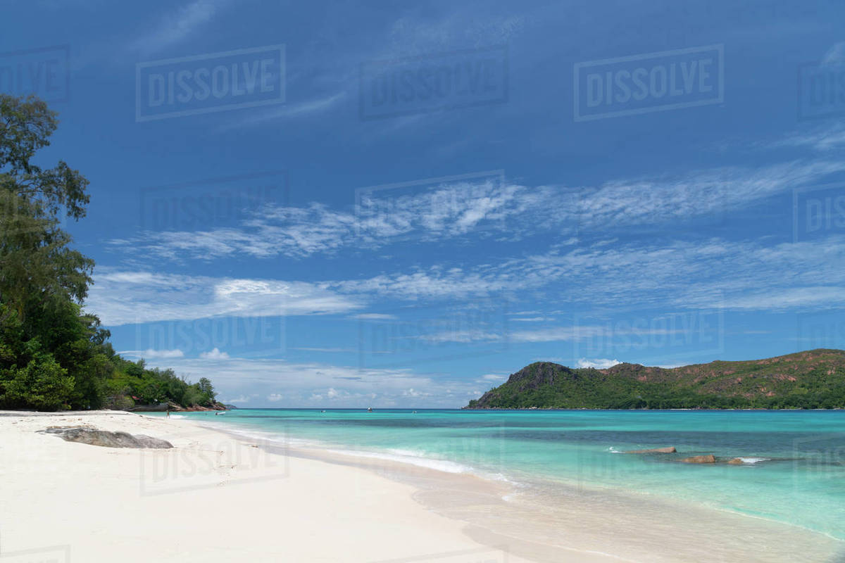 A view along Anse Boudin toward Curieuse Island from Praslin, Seychelles, Indian Ocean, Africa Royalty-free stock photo