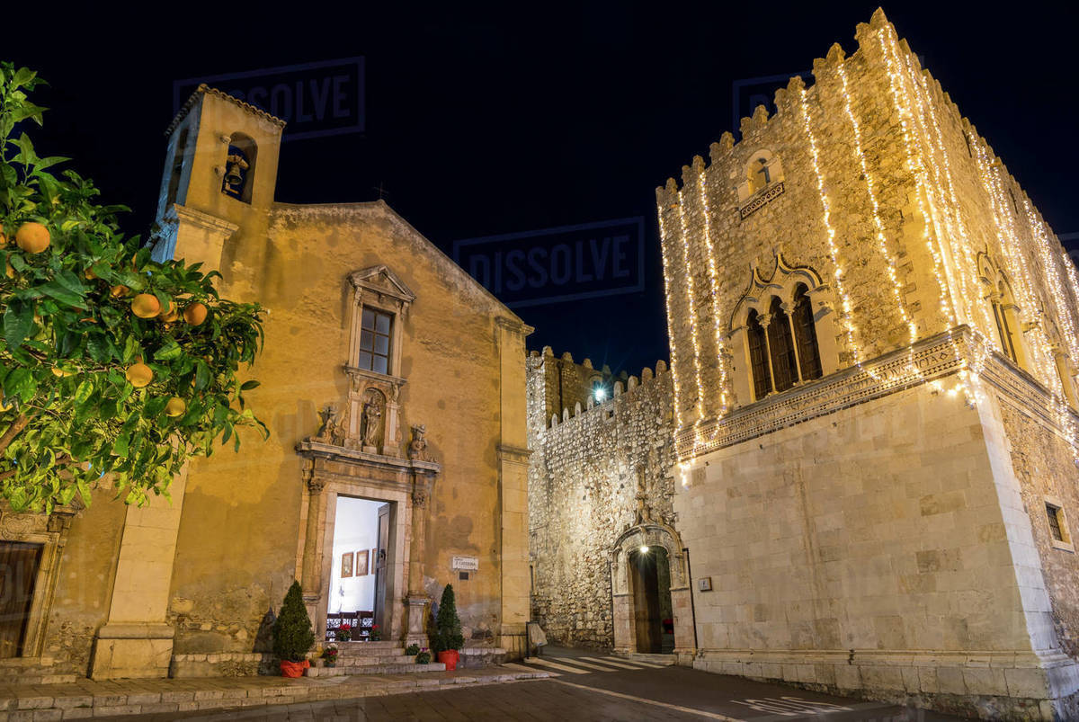 Illuminated Santa Caterina Church and Corvaja Palace at night, Taormina, Sicily, Italy, Europe Royalty-free stock photo