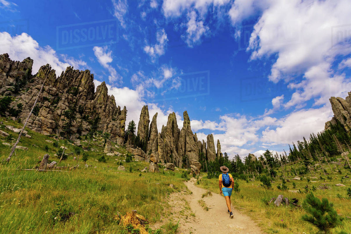 Man hiking the trails and enjoying the sights in the Black Hills of Keystone, South Dakota
