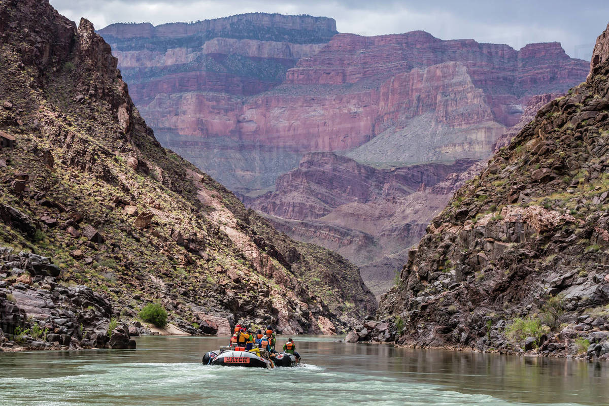Floating in a raft on the Colorado River, Grand Canyon National Park ...